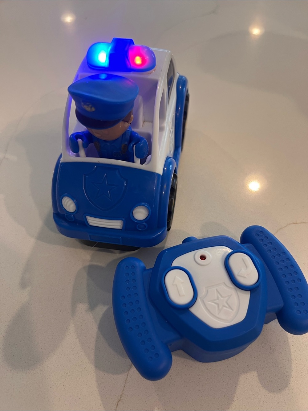 Blue Remote-Control Police Patrol Car with Lights and Figure